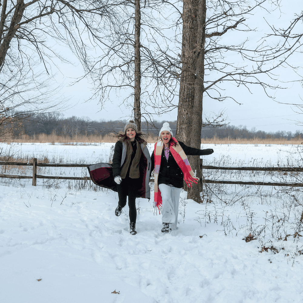 friends playing in snow